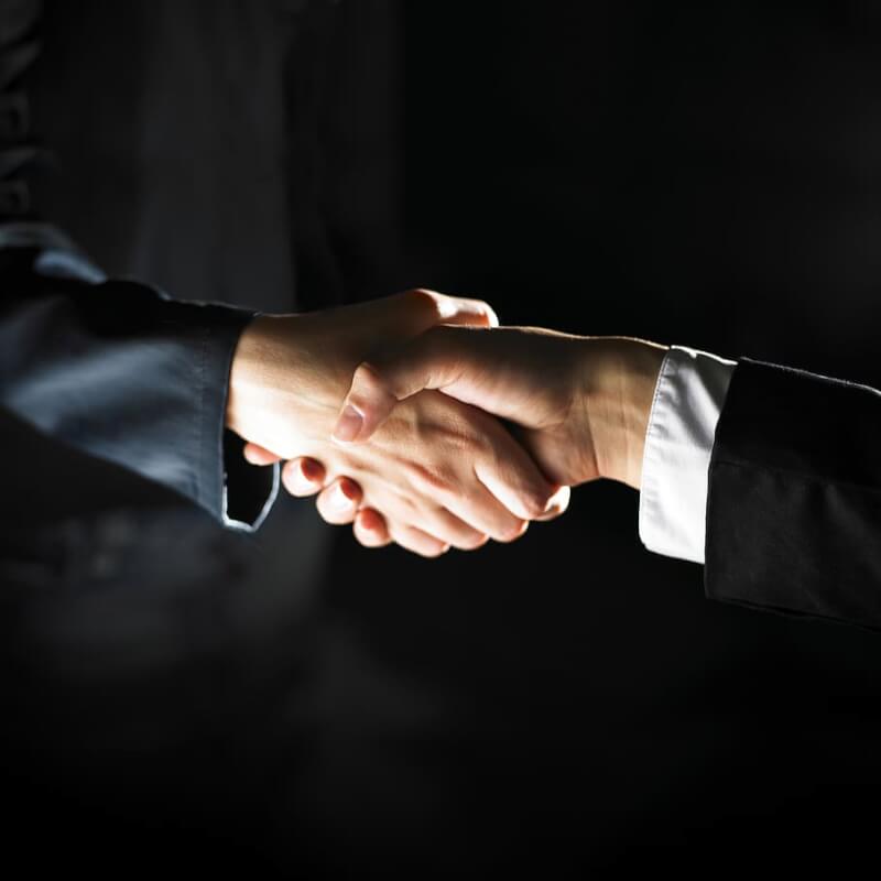 business-cooperation-handshake-people